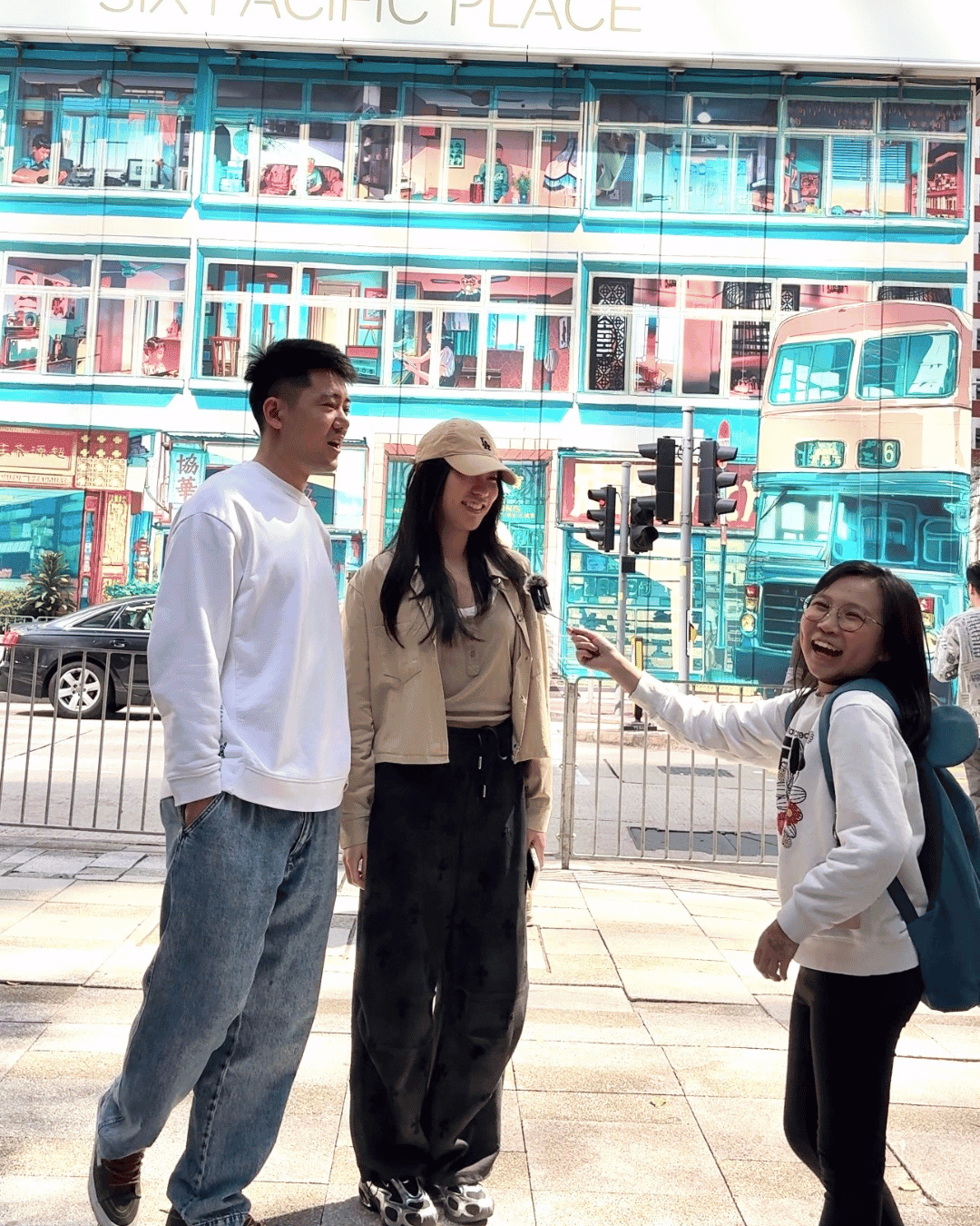 Kid interviewing someone on the street